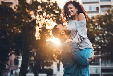 Carry, happy and couple in city in morning for fun,...