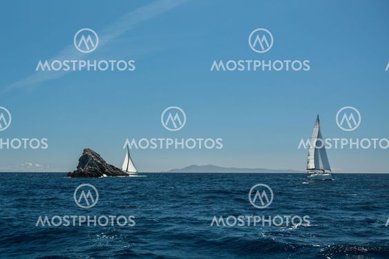 Sailing in the wind through the waves at Sea. Luxury...