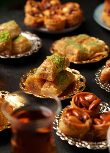 Delicious assortment of traditional pastries served on...