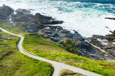Rough and rocky shore at Malin Head, Ireland's...