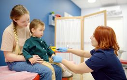 Baby and his mother are being seen by a pediatric...