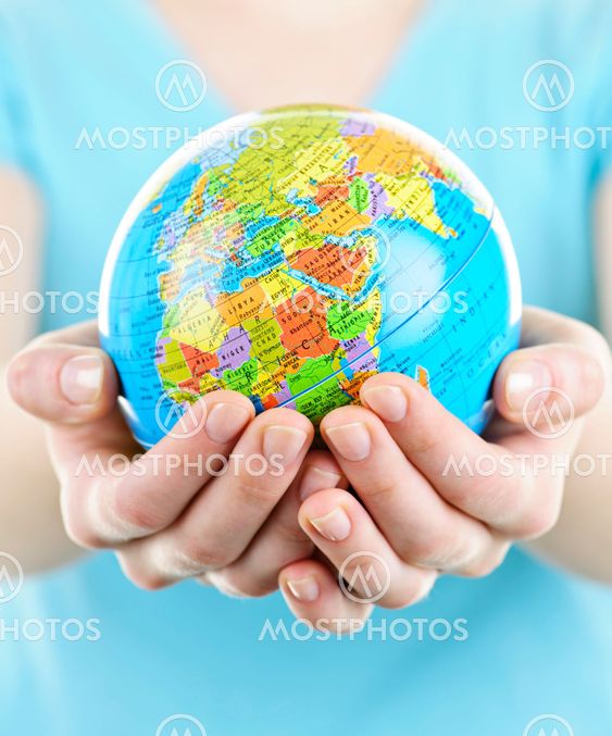 Hands holding globe