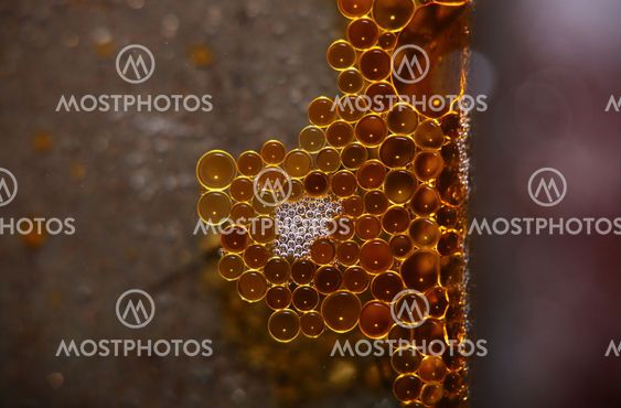 Drops of grease in a regular pattern