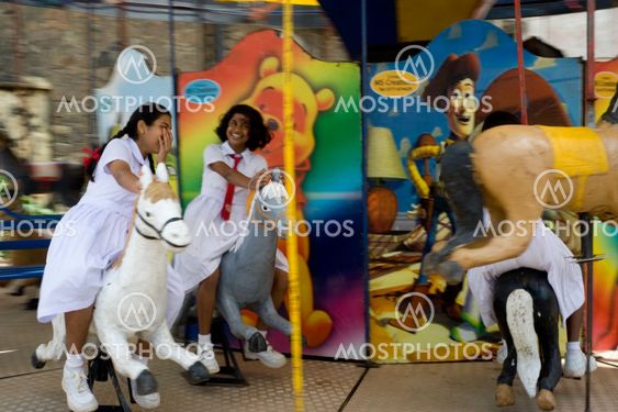 Girls on carusel