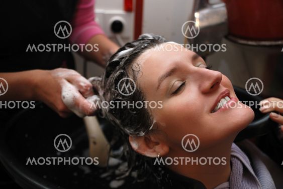 Beautyful young woman enjoying a hair-wash
