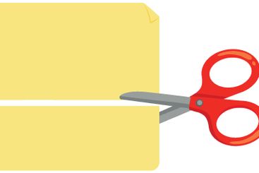 Red scissors cutting a piece of yellow paper