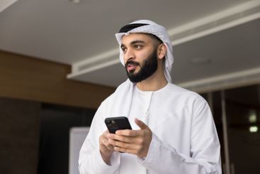 Young man dressed in traditional Middle Eastern...