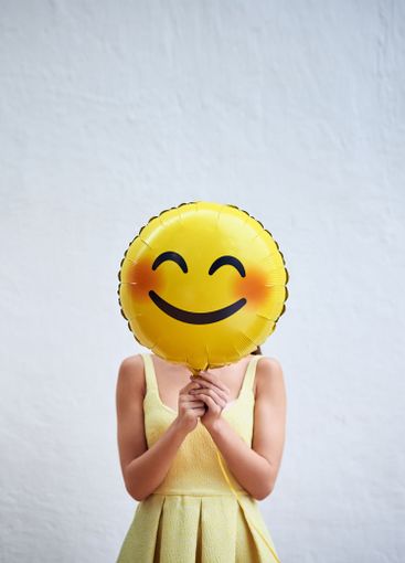 Happy woman, emoji and face with shape for joy, emotion...