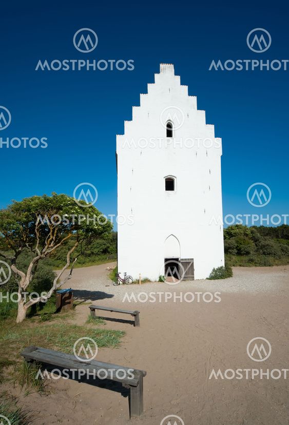 tilsandede kirke