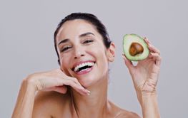 Wellness, skincare and portrait of woman with avocado for...