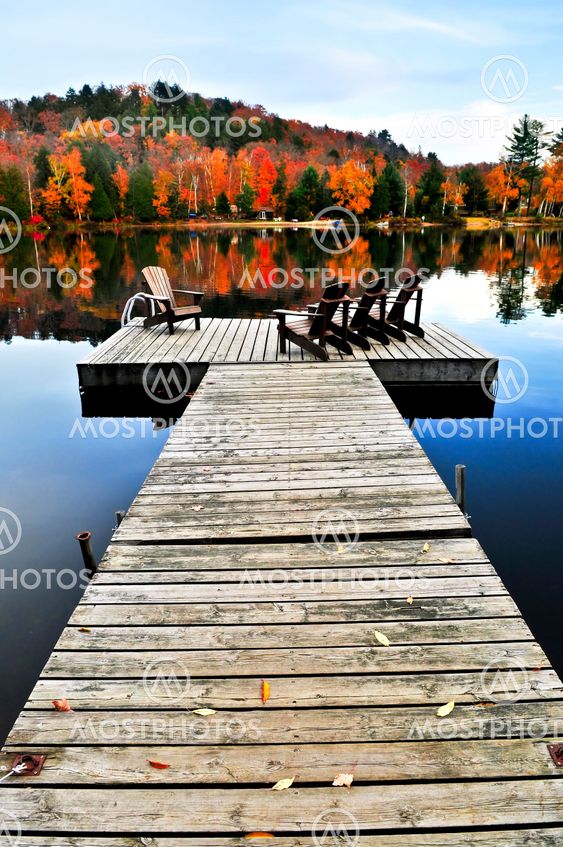 Wooden dock on autumn lake