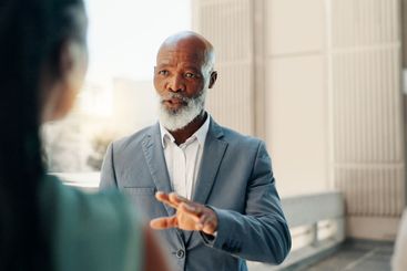 Meeting, talking and teamwork with business man in city...