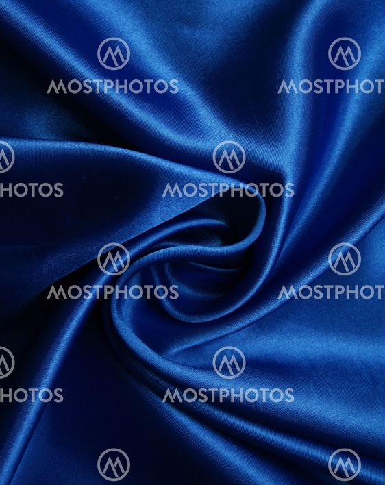 Smooth elegant dark blue silk as background