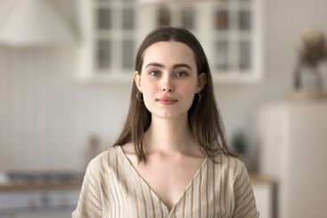Head shot portrait young casual beautiful woman posing...