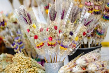 Traditional Lithuanian Easter palms known as verbos sold...