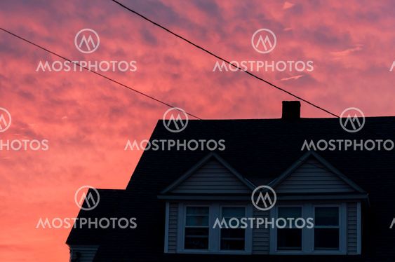 sunset creates an orange tone to the houses