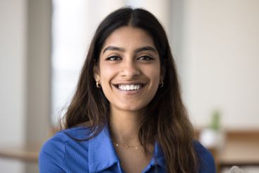 Head shot portrait of beautiful young Indian woman