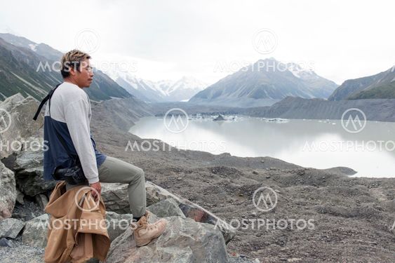 A man at Tasman Glacier viewpoint where New Zealand’s longest
