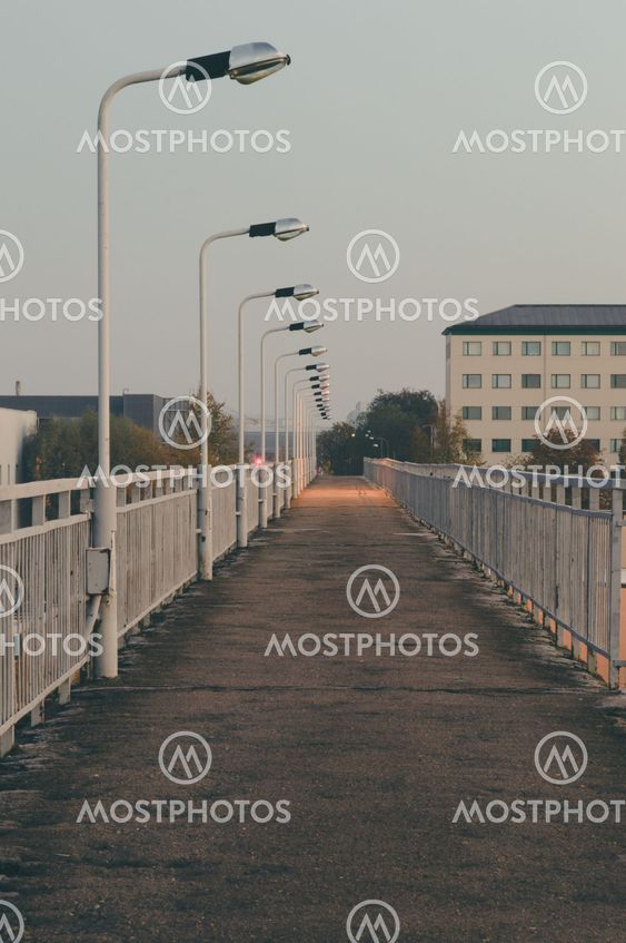 Empty pedestrian bridge at dusk