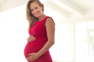 Home, pregnancy and woman in portrait for motherhood,...