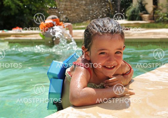 little girl in swimming pool