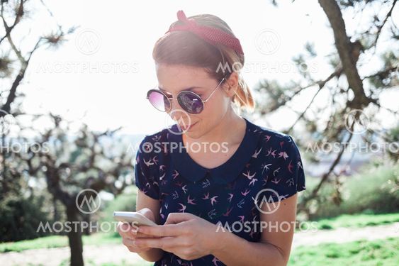 Young woman using smartphone