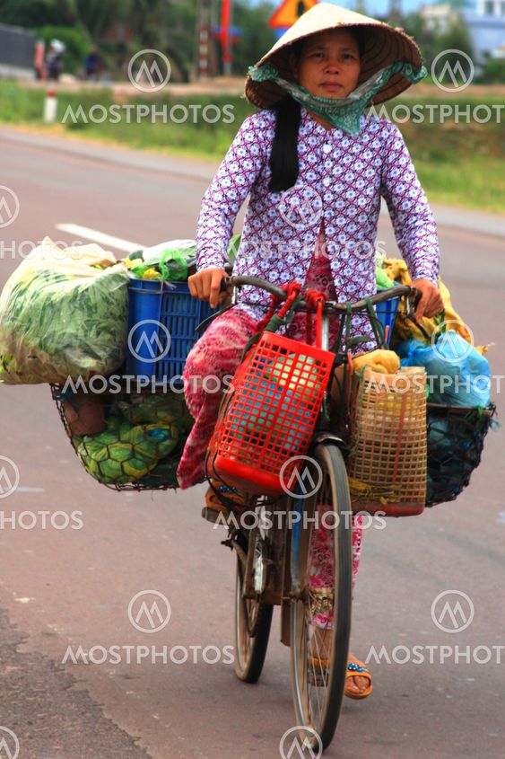 Vietnamese lady on her bicycle