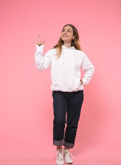 Full length image of Smiling woman wearing in casual...