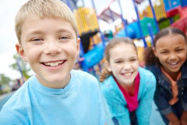 Happy kids, boy and portrait in playground on outdoor...