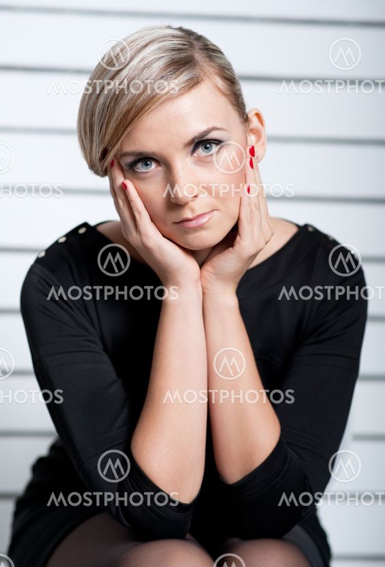 The young girl in a black dress, reflected