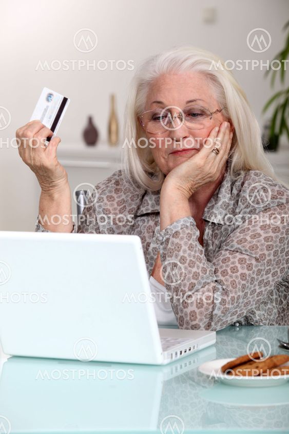Elderly woman shopping on-line