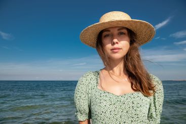 Portrait of young 30-year-old smiling European woman in...