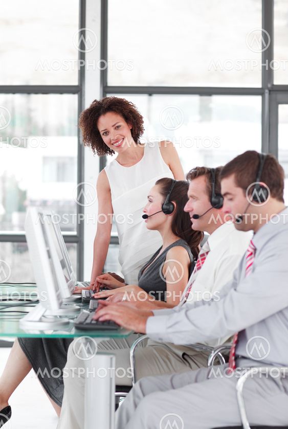 Happy female manager with her sale representative team