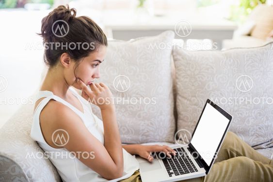 Young woman using laptop