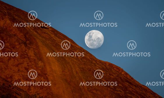 The Fullmoon rises over Spitzkoppe in Namibia