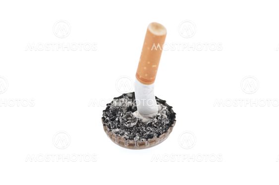 Cigarette butt and ash in a bottle cap