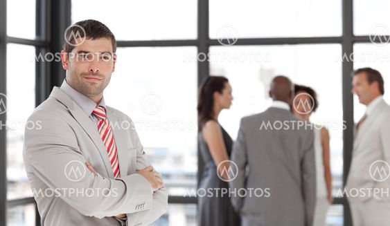 Latin confident male manager leading his team
