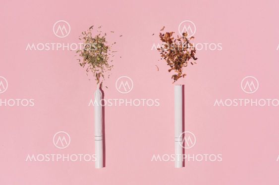 Hipster photo of two Cigarettes, one with tobacco,...