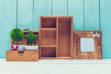 Shabby chic style home decorations on wooden background