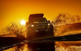 Off road tourist car rides off-road in the highlands....