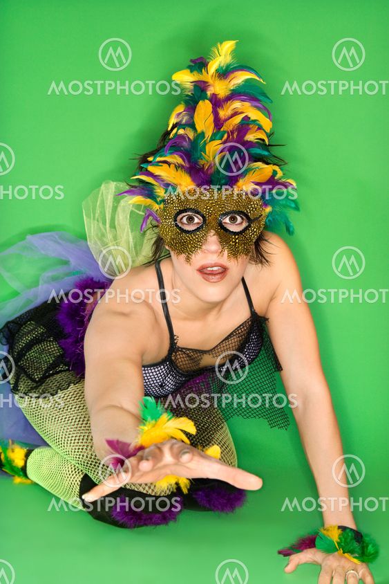 Woman in Mardi Gras costume.