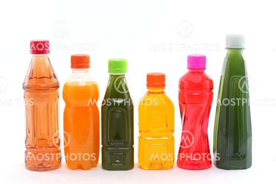 Bottles of Fruit Juices on White Background