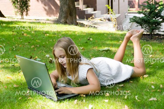Cute girl with laptop