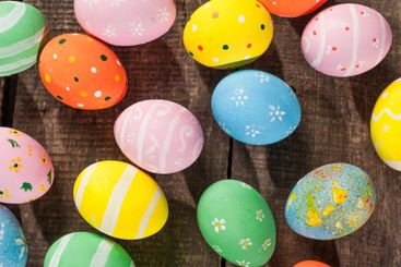 Vintage colorful easter eggs on wood table background
