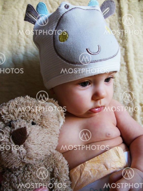 baby and teddy bear