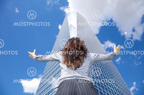 woman adoring crystal skyscraper