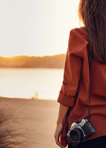 Woman with her vintage camera