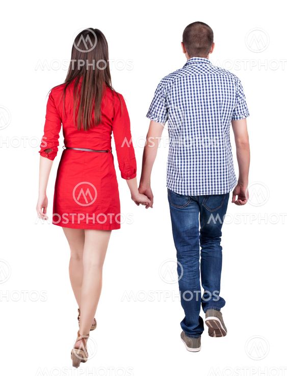 Back view going couple. walking friendly girl and guy...