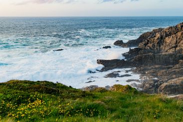 Rough and rocky shore at Malin Head, Ireland's...