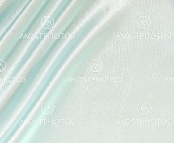 Smooth elegant blue silk as background